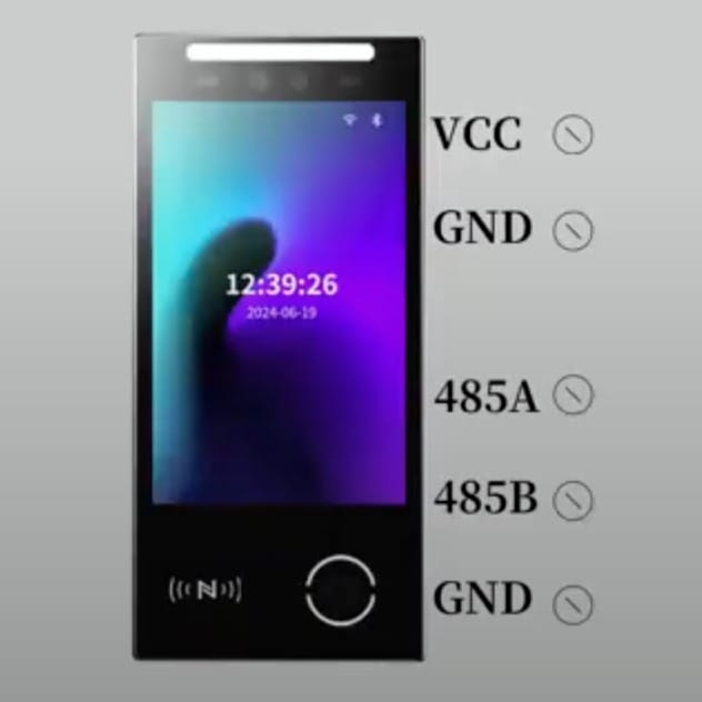 Top view of a team working on construction plans in an office setting.